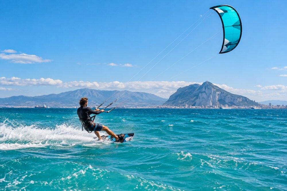 Kitesurfer riding off the coast of Tarifa, Spain